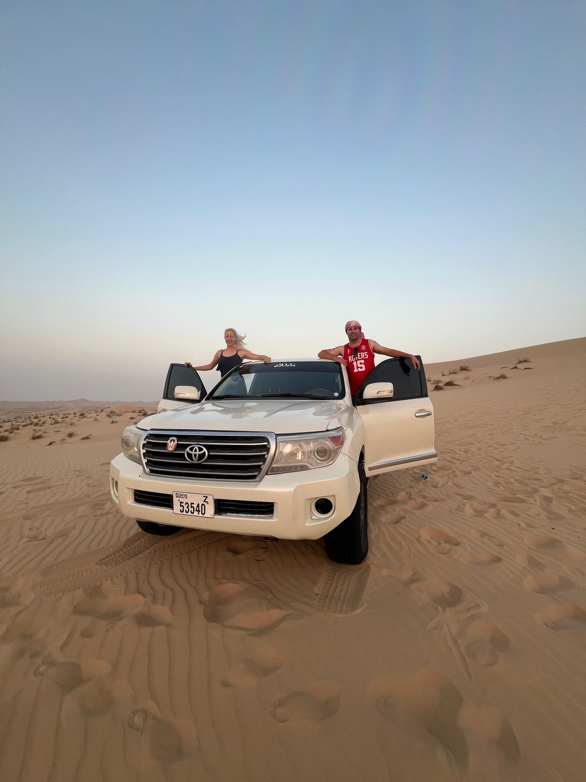 Guests relaxing in a traditional camp in the desert