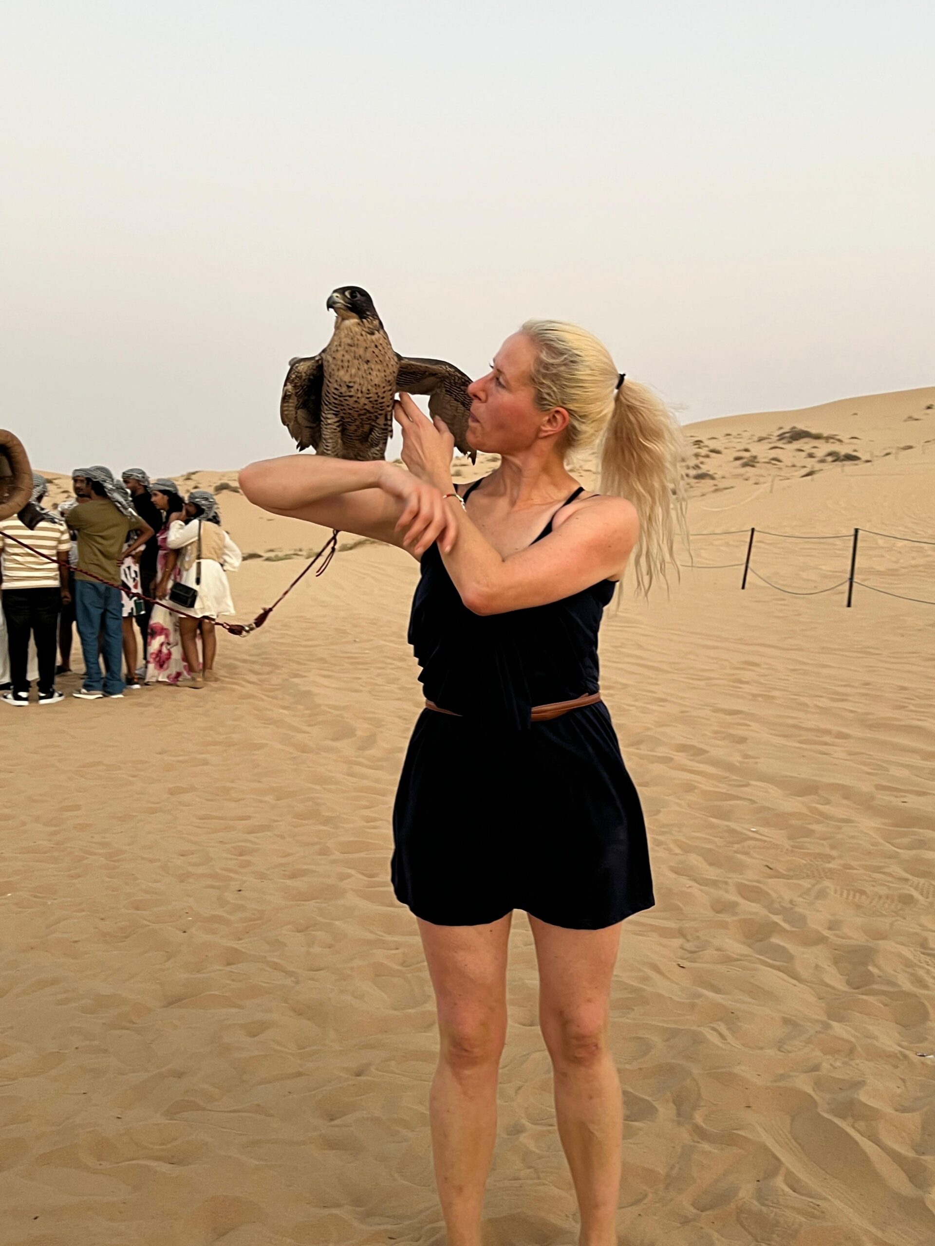 A captivating belly dance performance on the main stage under the stars at an Abu Dhabi desert camp