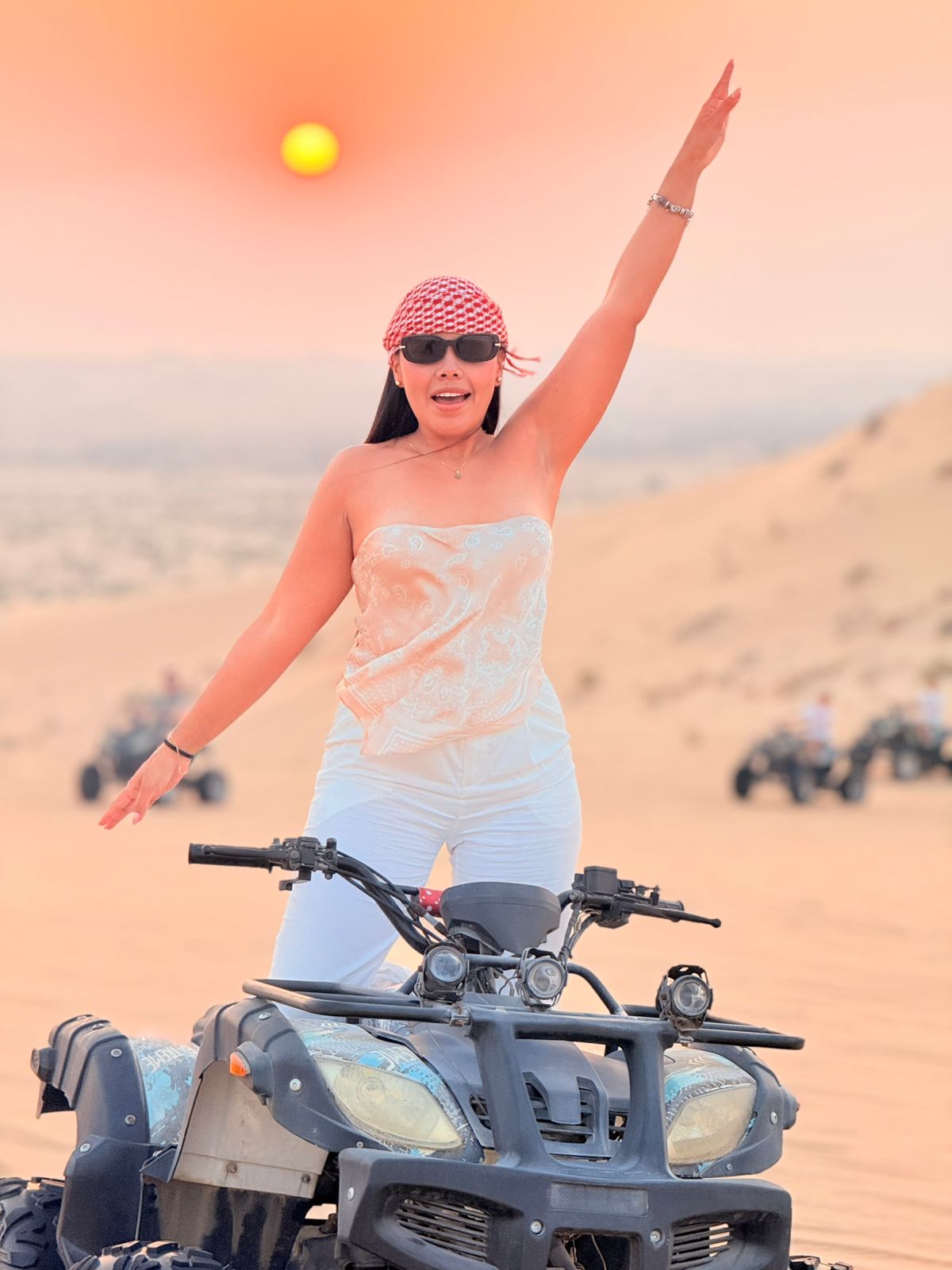 Guests arriving at the desert camp at sunset to begin their unforgettable overnight desert safari in Abu Dhabi